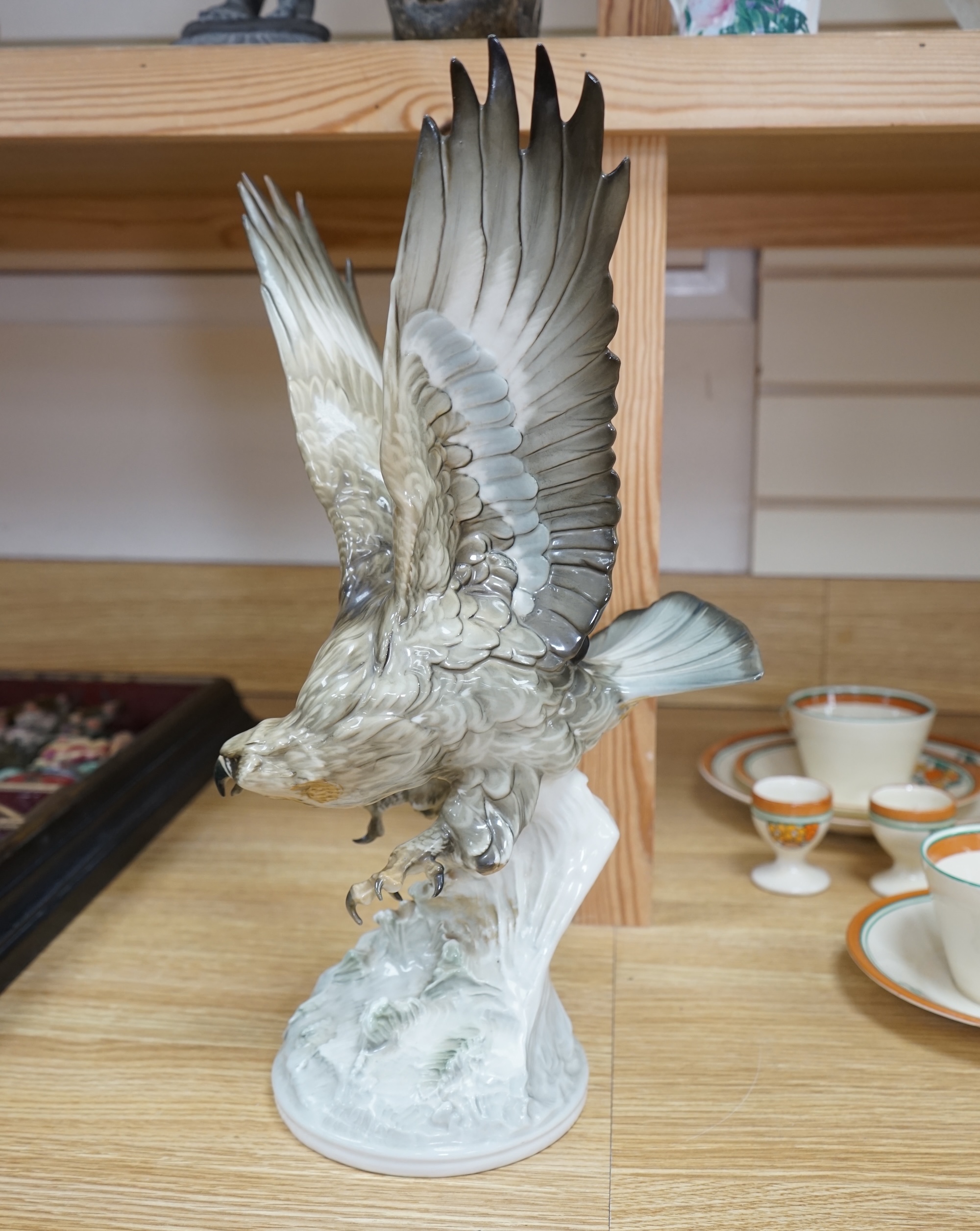 Karl Tutter (1883-1969) for Kutschenreuther, a porcelain model of a hawk, 42cm. Condition - restoration? otherwise good